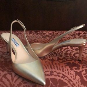 Gold sling back heels